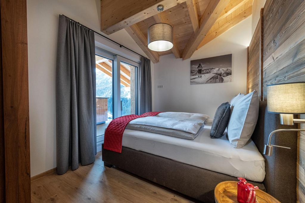 Postel nebo postele na pokoji v ubytování AlpenParks Premium Apartment Rehrenberg II