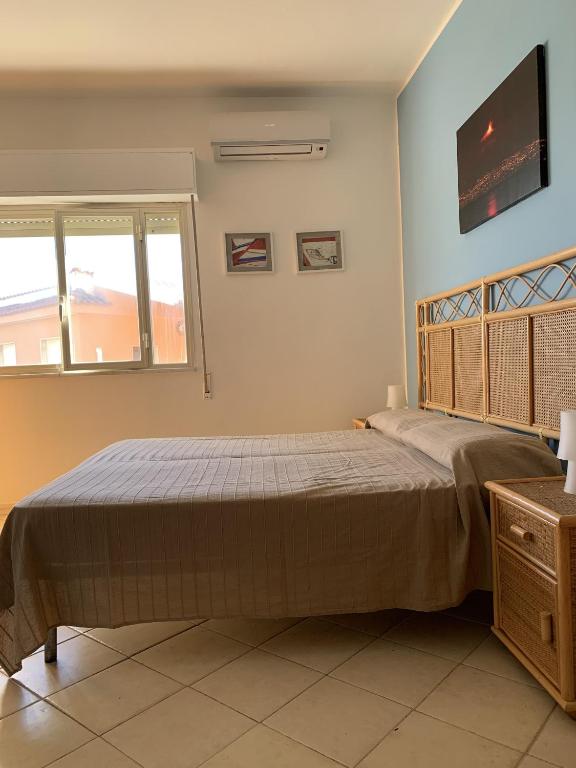 Ένα ή περισσότερα κρεβάτια σε δωμάτιο στο Hotel Il Triangolo