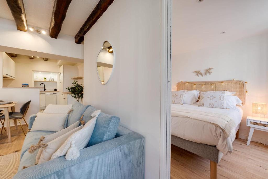Posteľ alebo postele v izbe v ubytovaní Le Grenette - Appartement pour 2 à 4 personnes en plein coeur d'Annecy
