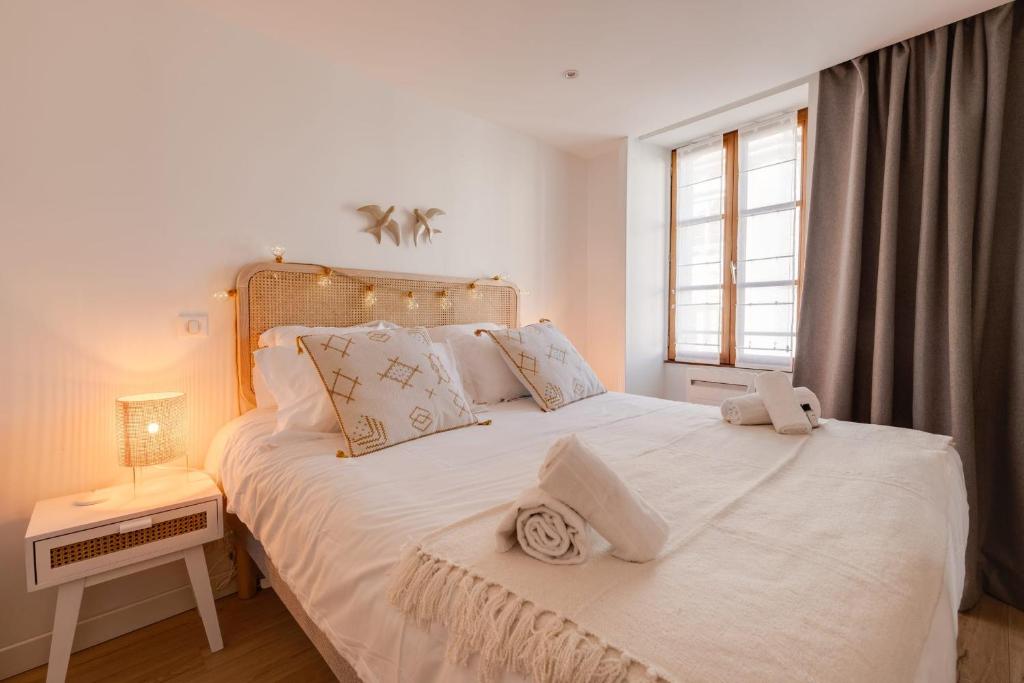 Posteľ alebo postele v izbe v ubytovaní Le Grenette - Appartement pour 2 à 4 personnes en plein coeur d'Annecy