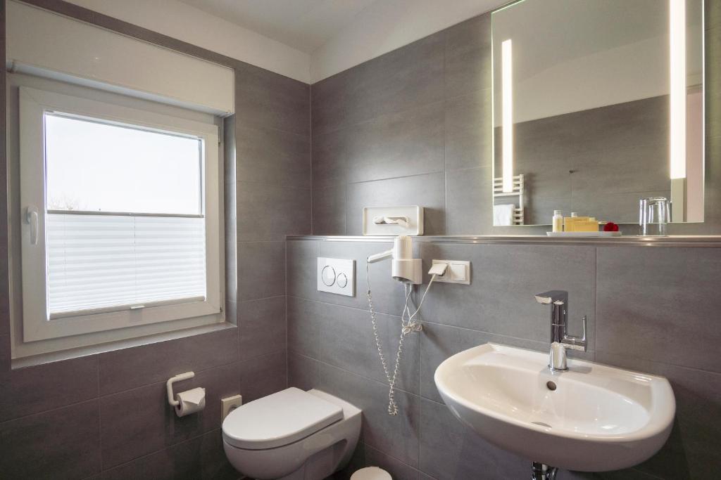 Koupelna v ubytování Hotel Elysee