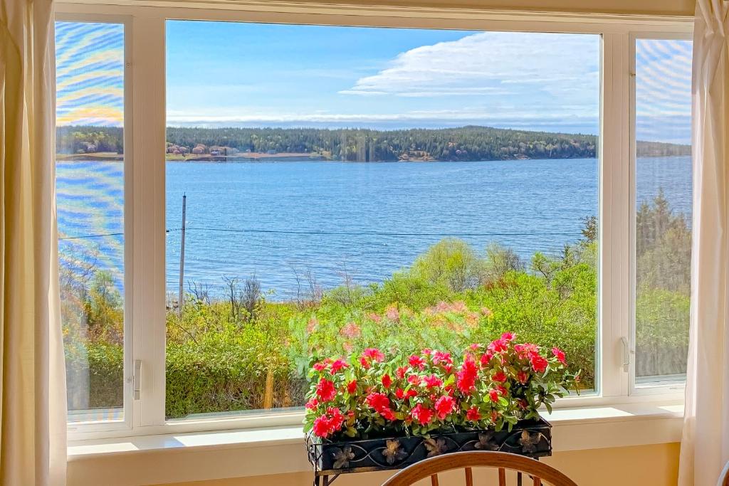 a window with a view of the water at Pigeon Hill Retreat in Steuben
