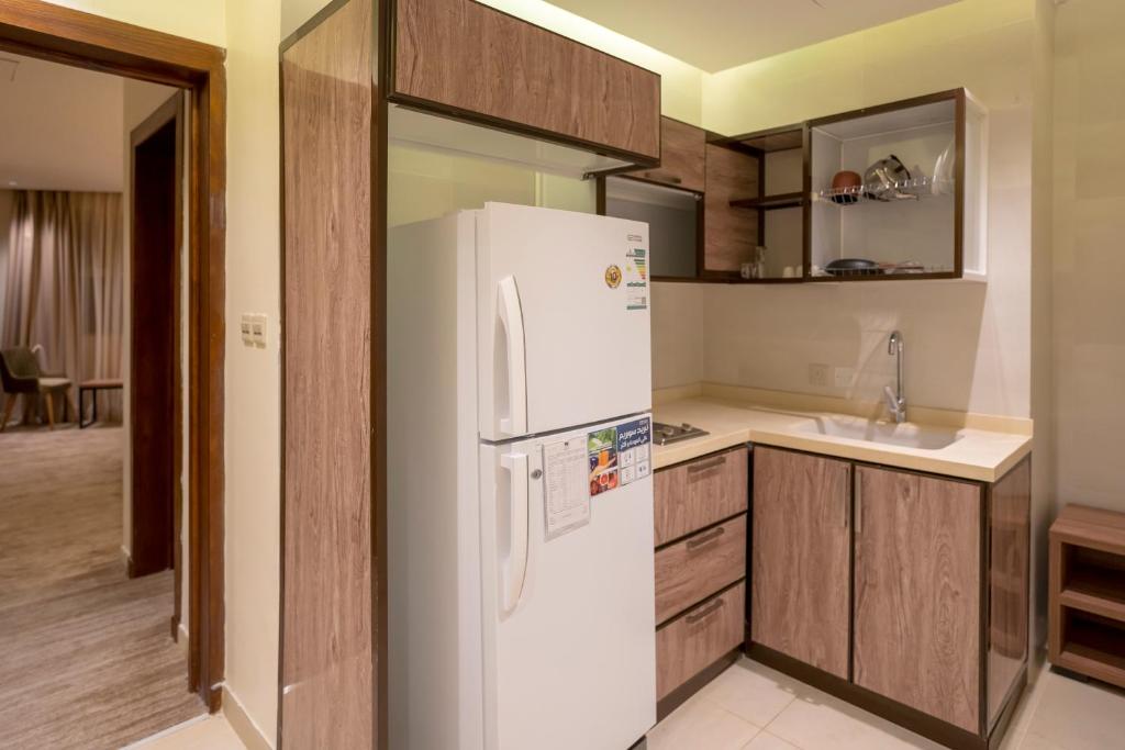 Kuchyň nebo kuchyňský kout v ubytování W Suites Hotel