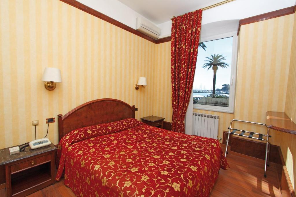 Postel nebo postele na pokoji v ubytování Hotel Miro'