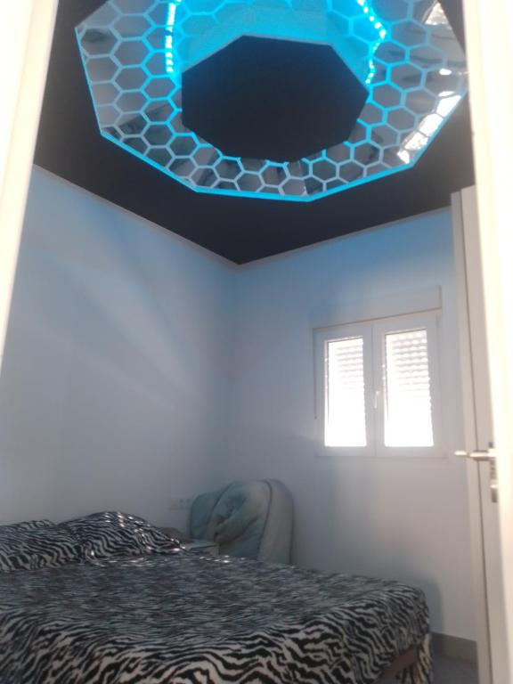 Łóżko lub łóżka w pokoju w obiekcie Apartamento relax con piscina y jacussy spa