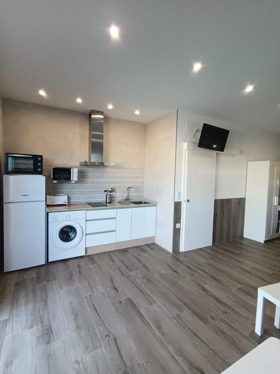 Kuchyňa alebo kuchynka v ubytovaní APARTAMENTO AMARÉ