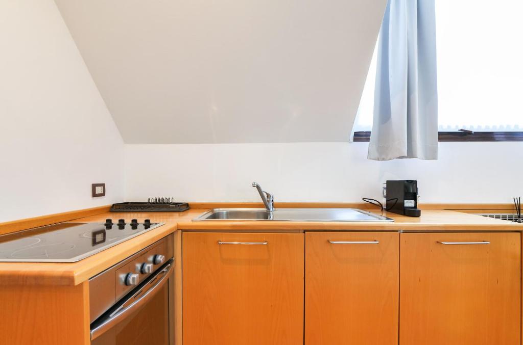 Kuchnia lub aneks kuchenny w obiekcie Duomo Luxury Apartment VIII