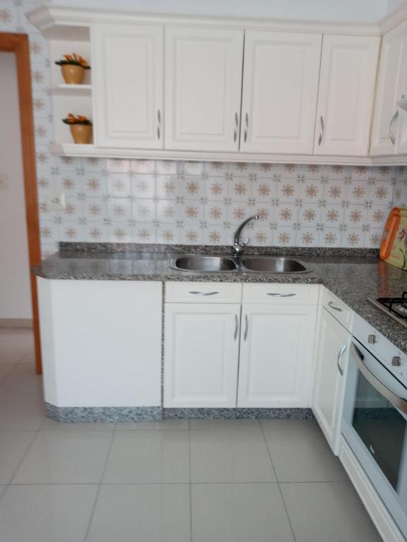 Kuchyňa alebo kuchynka v ubytovaní Apartamento Combarro Ángeles
