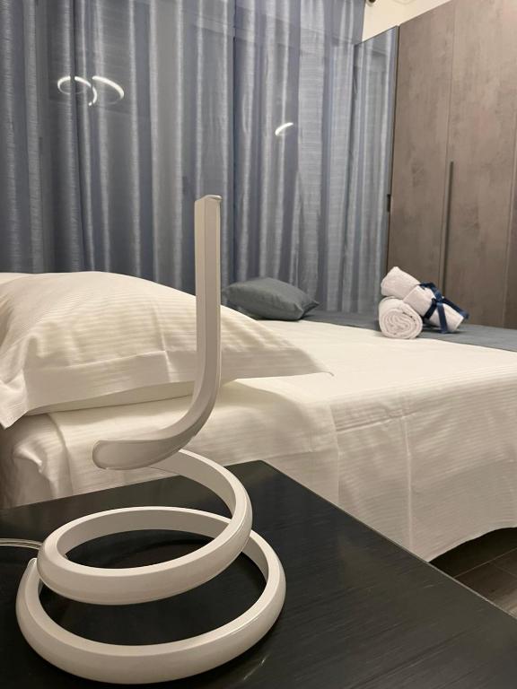 Postel nebo postele na pokoji v ubytování Foresteria Opera