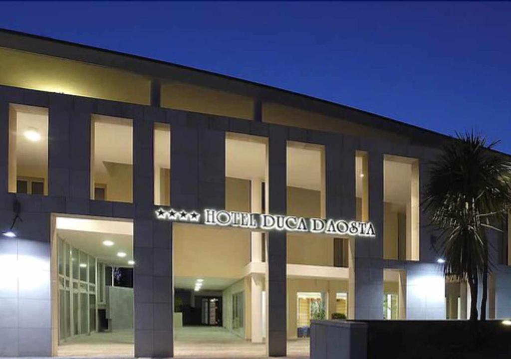 a building with a sign that reads houston dixon dixoniasis at HOTEL DUCA D'AOSTA in Mogliano Veneto