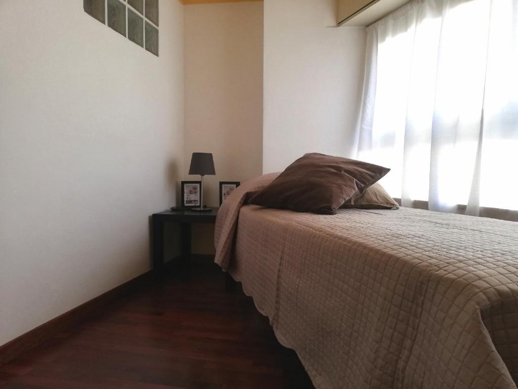 A bed or beds in a room at Catania Amuri Home