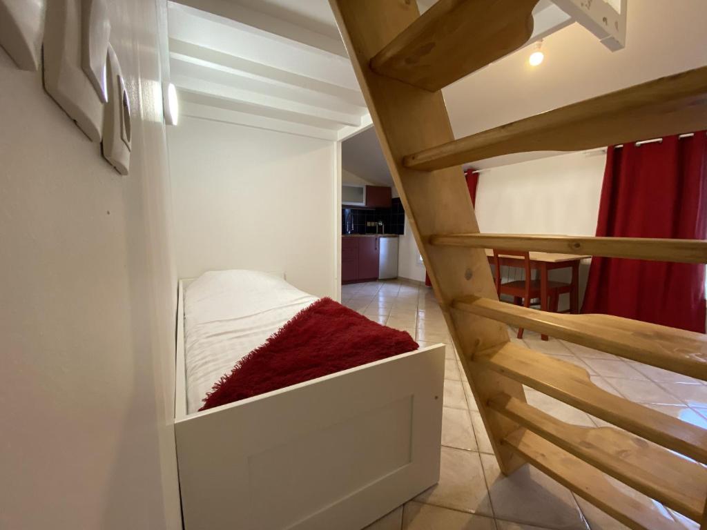 Ein Etagenbett oder Etagenbetten in einem Zimmer der Unterkunft Studios NMM