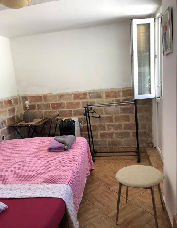 Llit o llits en una habitació de Hostel Anton