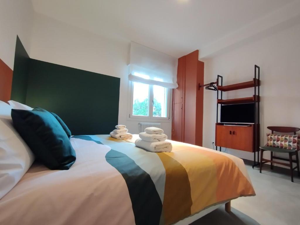 Posteľ alebo postele v izbe v ubytovaní A casa di Twiggy