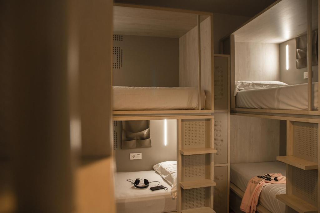 Postel nebo postele na pokoji v ubytování room00 Salvador Hostel