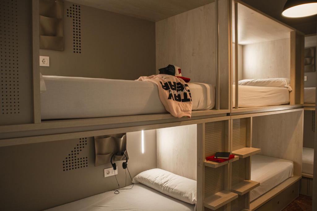 Postel nebo postele na pokoji v ubytování room00 Salvador Hostel