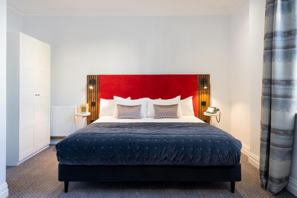Postel nebo postele na pokoji v ubytování The Berkeley Square Hotel Bristol