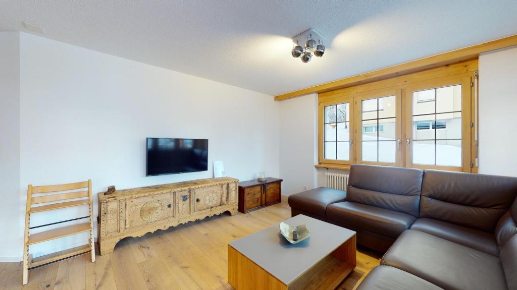 TV a/nebo společenská místnost v ubytování Haus Marietta - Leukerbad