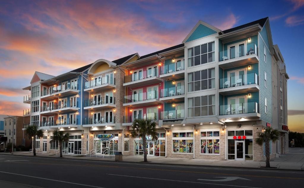 a rendering of a building on a city street at Ocean Escape Condos in Myrtle Beach