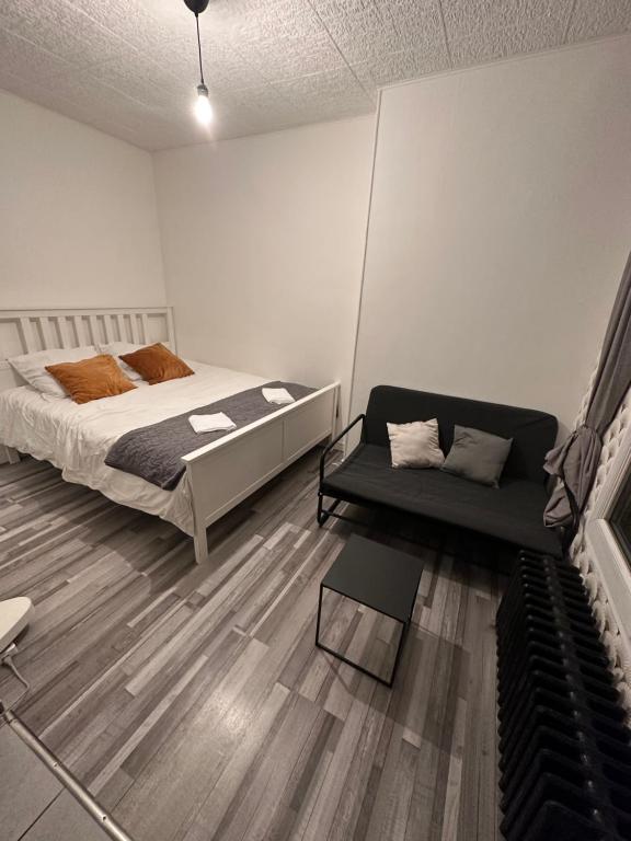 Säng eller sängar i ett rum på Studio cosy à Bagneux RER B à 500m