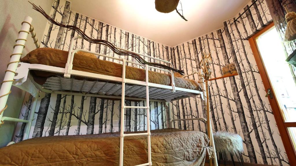 Postel nebo postele na pokoji v ubytování Le Case Nel Bosco Terminillo