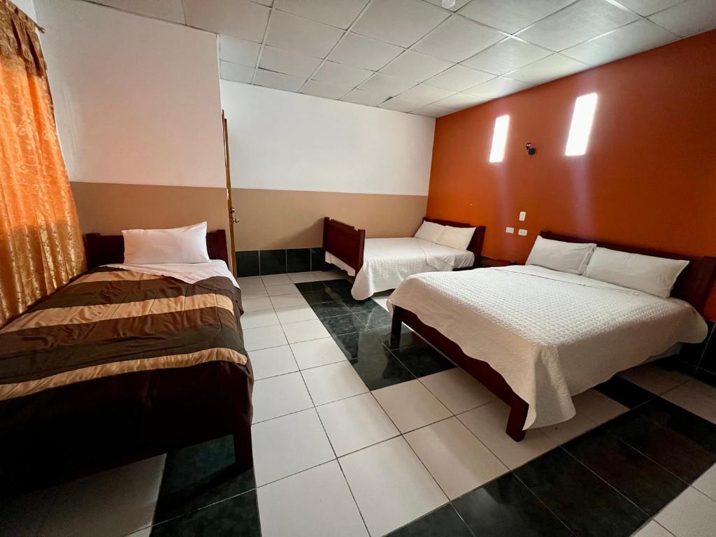 Postel nebo postele na pokoji v ubytování Hostal Alpachaca - New Quito Airport