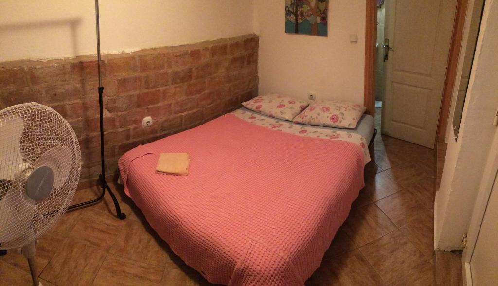 Llit o llits en una habitació de Hostel Anton