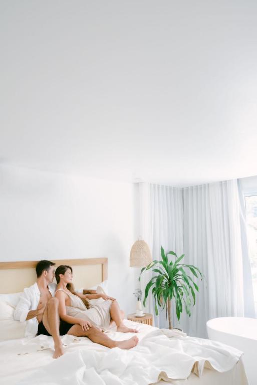 Cama ou camas em um quarto em Olisa Hotel Boutique