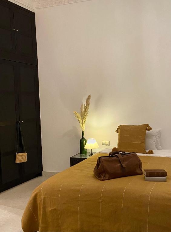 Postel nebo postele na pokoji v ubytování Riad Ksar Saad & Spa