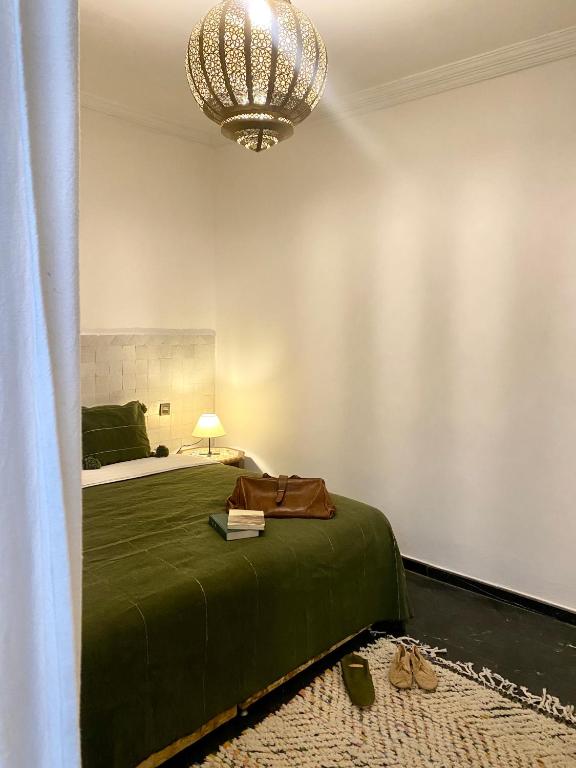 Postel nebo postele na pokoji v ubytování Riad Ksar Saad & Spa