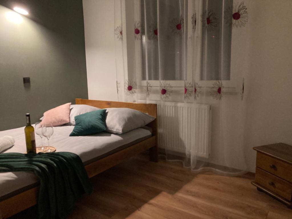 Postel nebo postele na pokoji v ubytování Agroturystyka u Podnóża Góry Cergowej