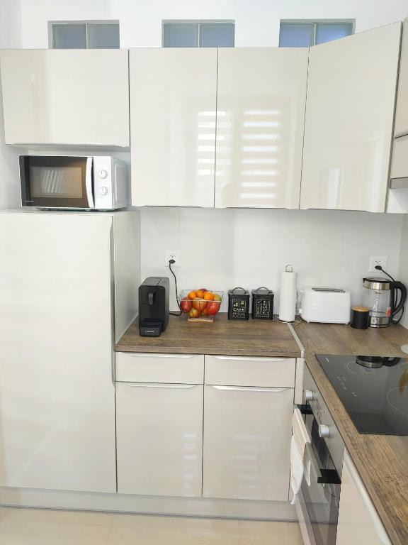 Kuchyň nebo kuchyňský kout v ubytování New apartment - MEMO - Le Locle