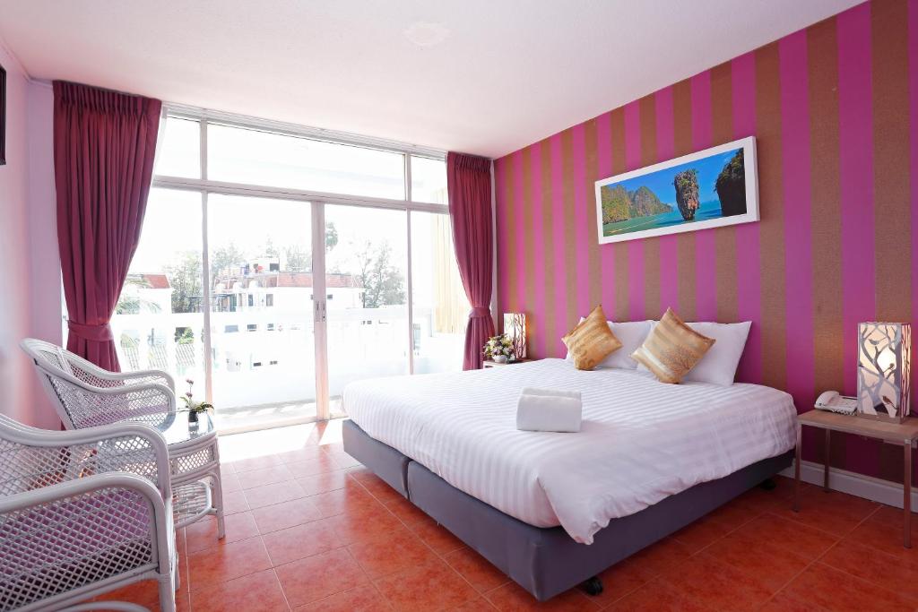 Postel nebo postele na pokoji v ubytování ON Hotel Phuket - SHA