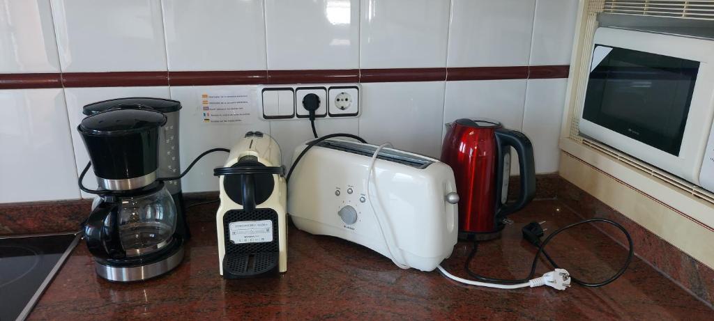 Příslušenství pro přípravu čaje a kávy v ubytování Appartement Artit D1