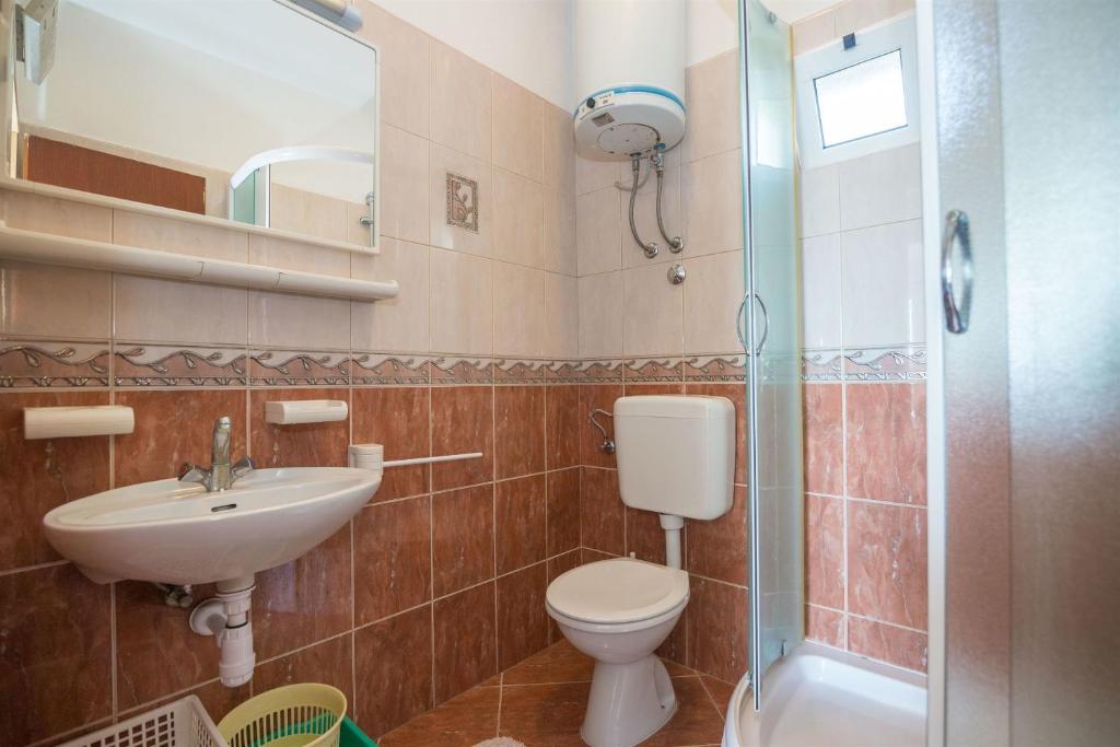 Koupelna v ubytování Apartments Tolj