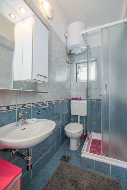 Koupelna v ubytování Apartments Tolj