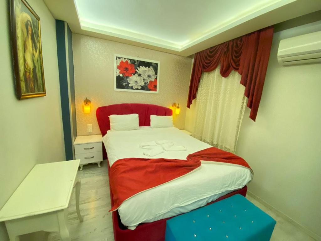 Postel nebo postele na pokoji v ubytování Şirinyer Elit Residance Apart Hotel