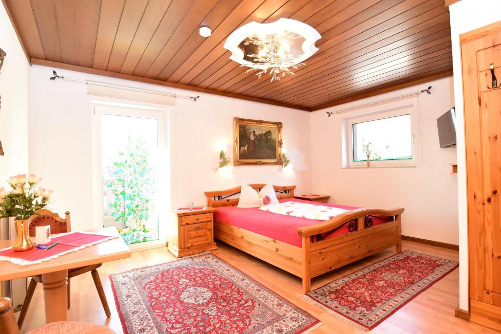 Postel nebo postele na pokoji v ubytování PM-APART Ries Rosina