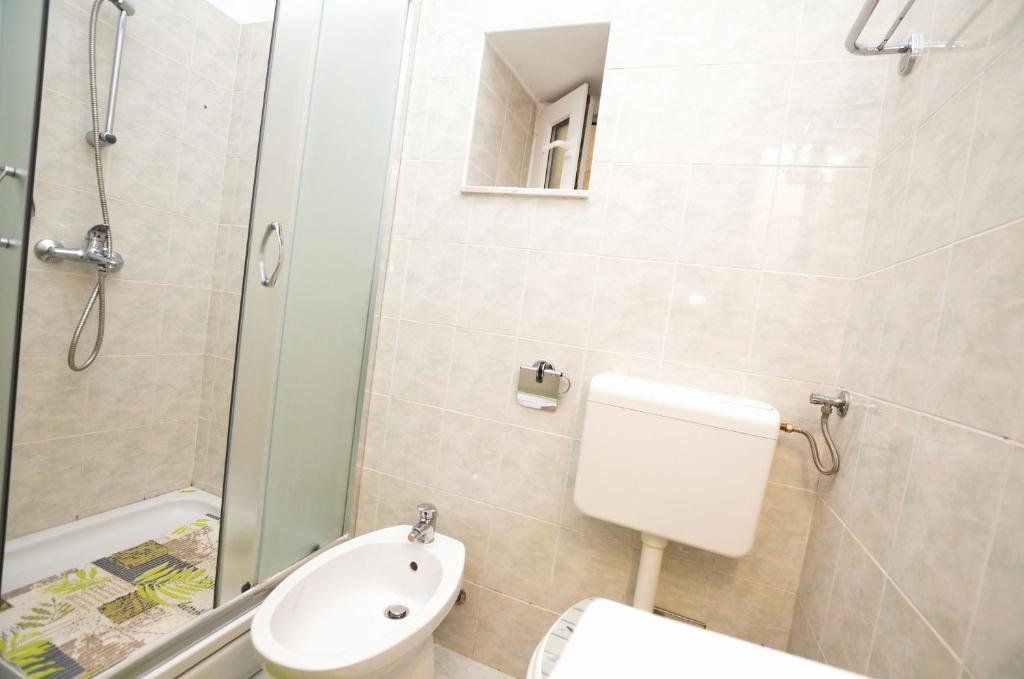 Koupelna v ubytování Apartments Romina