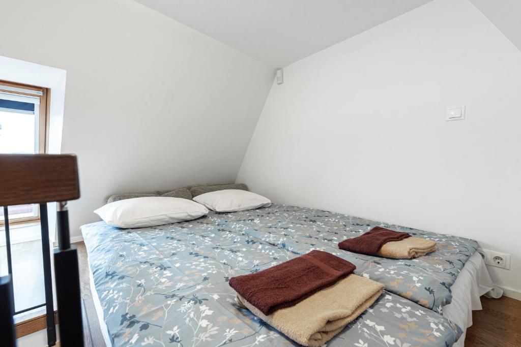Postel nebo postele na pokoji v ubytování AirHome - Raekoja Plats