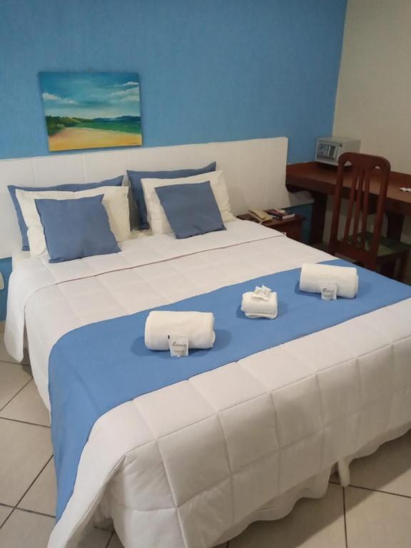Postel nebo postele na pokoji v ubytování Acrópolis Marina Hotel
