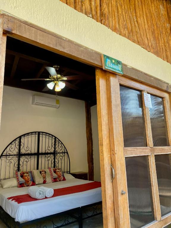 Postel nebo postele na pokoji v ubytování Cabañas Frida