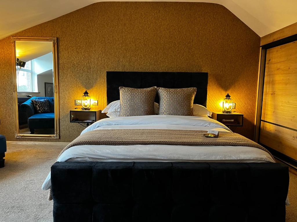 Postel nebo postele na pokoji v ubytování Rose Cottage B&B