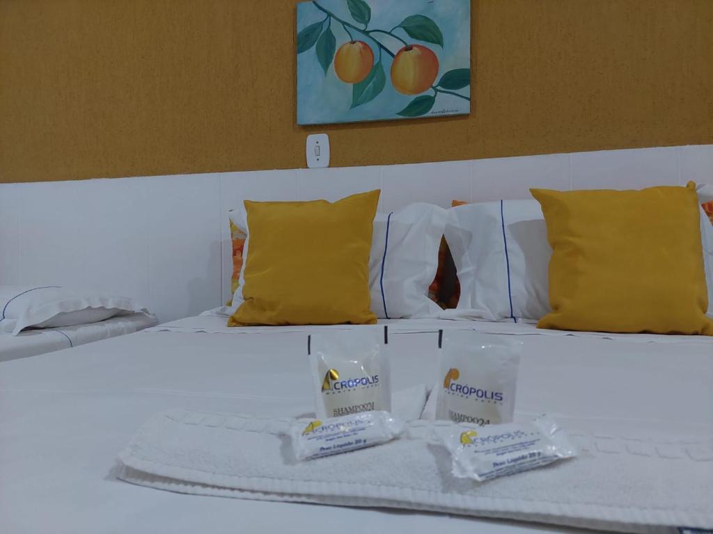 Postel nebo postele na pokoji v ubytování Acrópolis Marina Hotel