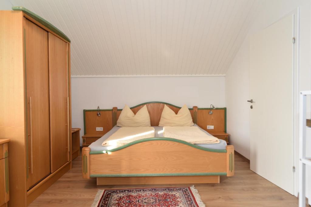 Postel nebo postele na pokoji v ubytování PM-APART Ries Rosina