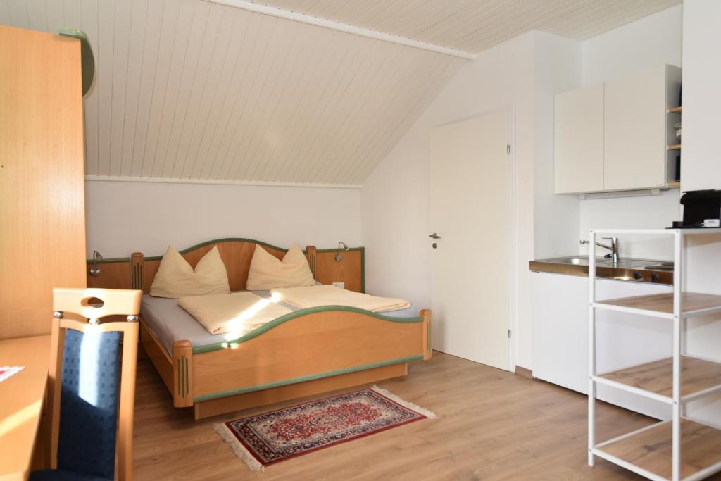 Postel nebo postele na pokoji v ubytování PM-APART Ries Rosina