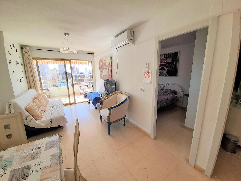 Posteľ alebo postele v izbe v ubytovaní Agustina apartment in Rincon de Loix -free parking, Wi-Fi, pool, new air conditioning, sea view