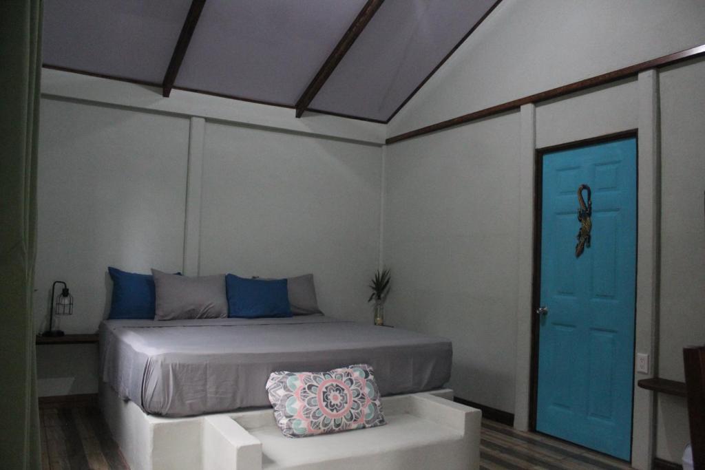 Postel nebo postele na pokoji v ubytování Cecropia Ecolodge