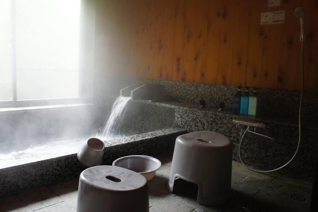 Posezení v ubytování EK House Hakone Shushinso 箱根修身荘