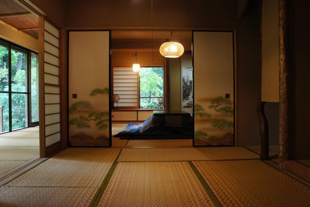 Postel nebo postele na pokoji v ubytování EK House Hakone Shushinso 箱根修身荘
